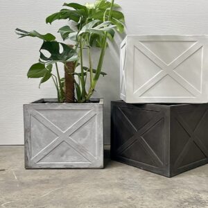 "Set of three square planters with cross-pattern design in black, white, and grey, modern indoor and outdoor garden pots."